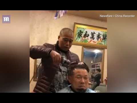 Chinese barber uses an ANGLE GRINDER to cut customers hair