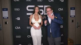 Model Daniella Oliver wears Designer Intrigue on the red carpet