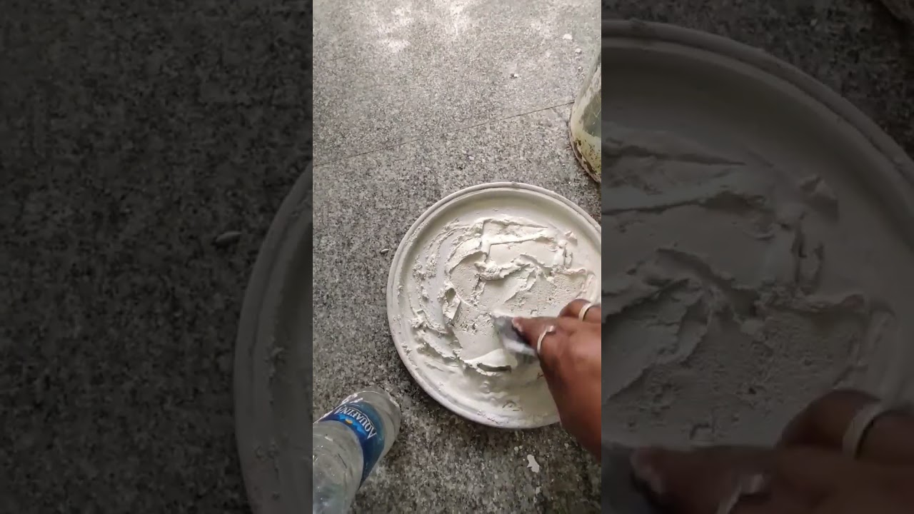 White cement filling in tiles gaps