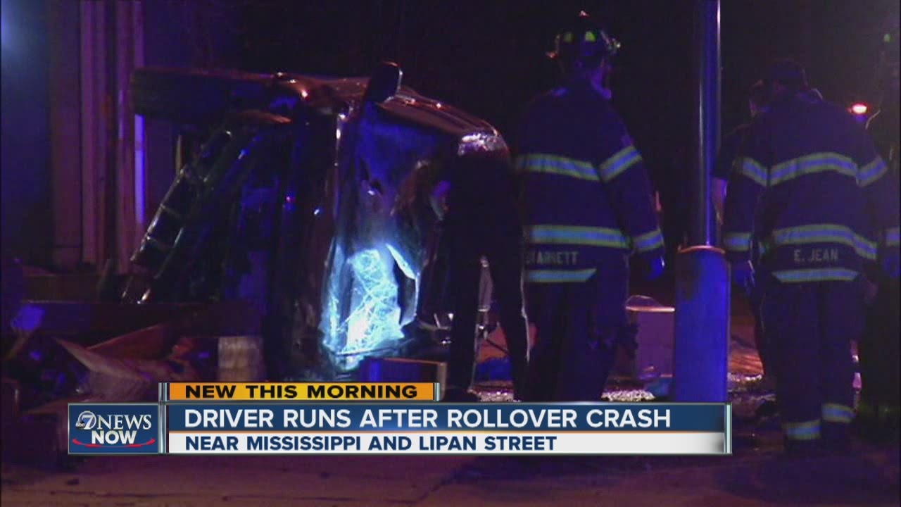 Driver runs after rollover crash - YouTube