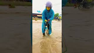 This man clears flooded roads by opening hidden drains