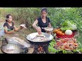 Survival in forest catch and cook fish for survival food fish sour sweet cooking with spicy recipe