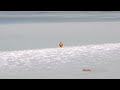 Paddleboarder rides bore tide on Alaska's Turnagain Arm