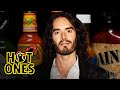 Russell Brand Serenades Superfan Brett Baker While Eating Spicy Wings | Hot Ones