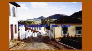 Cidadezinha Qualquer (Um Poema de Carlos Drummond de Andrade) Cidadezinha Qualquer (Um Poema de Carlos Drummond de Andrade)