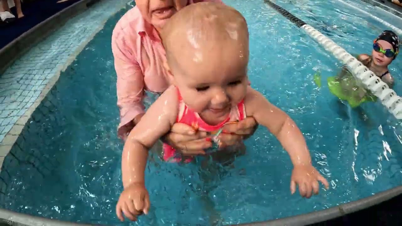Baby swimmer 10 months long assisted swim