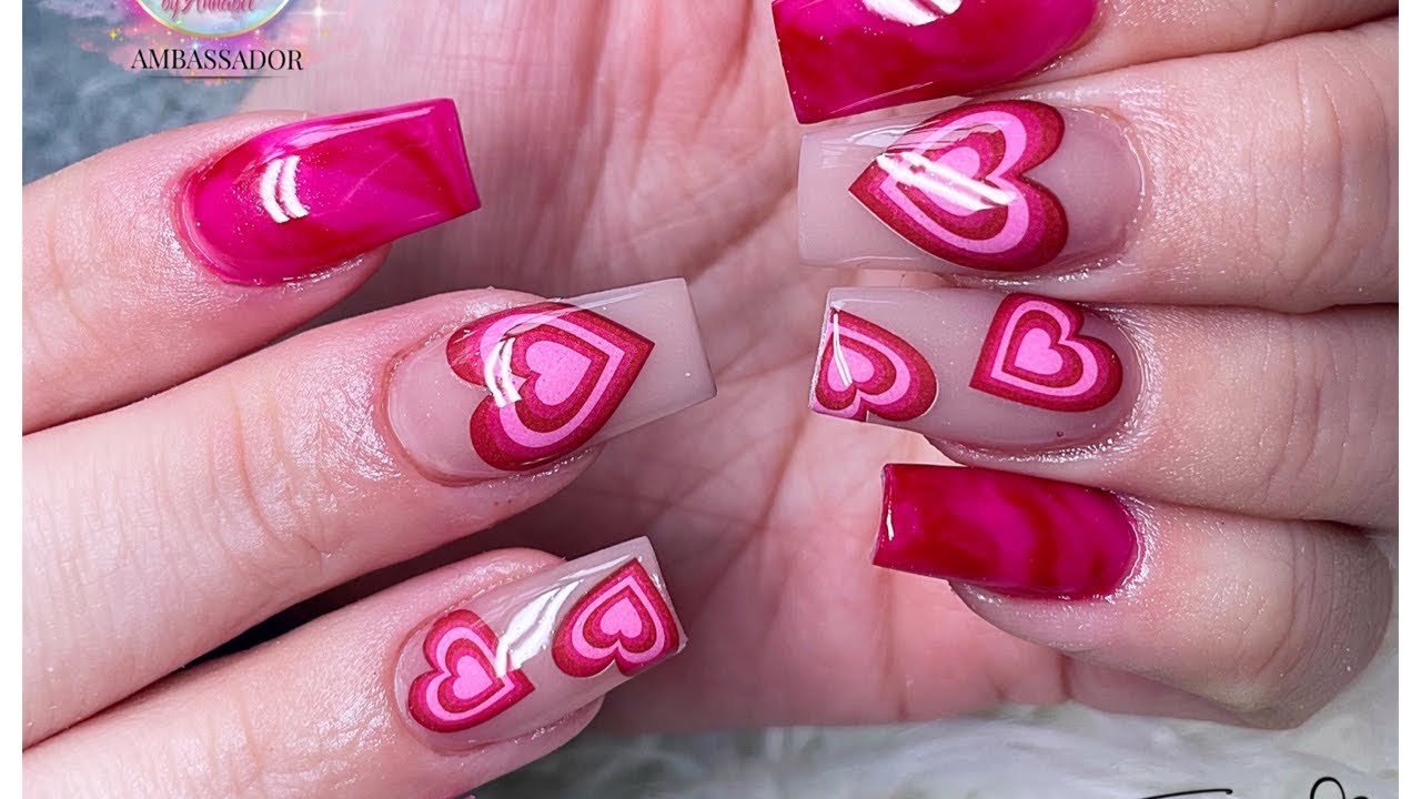 Love is in the air! 💕❤️ valentines acrylic nails with heart nail art