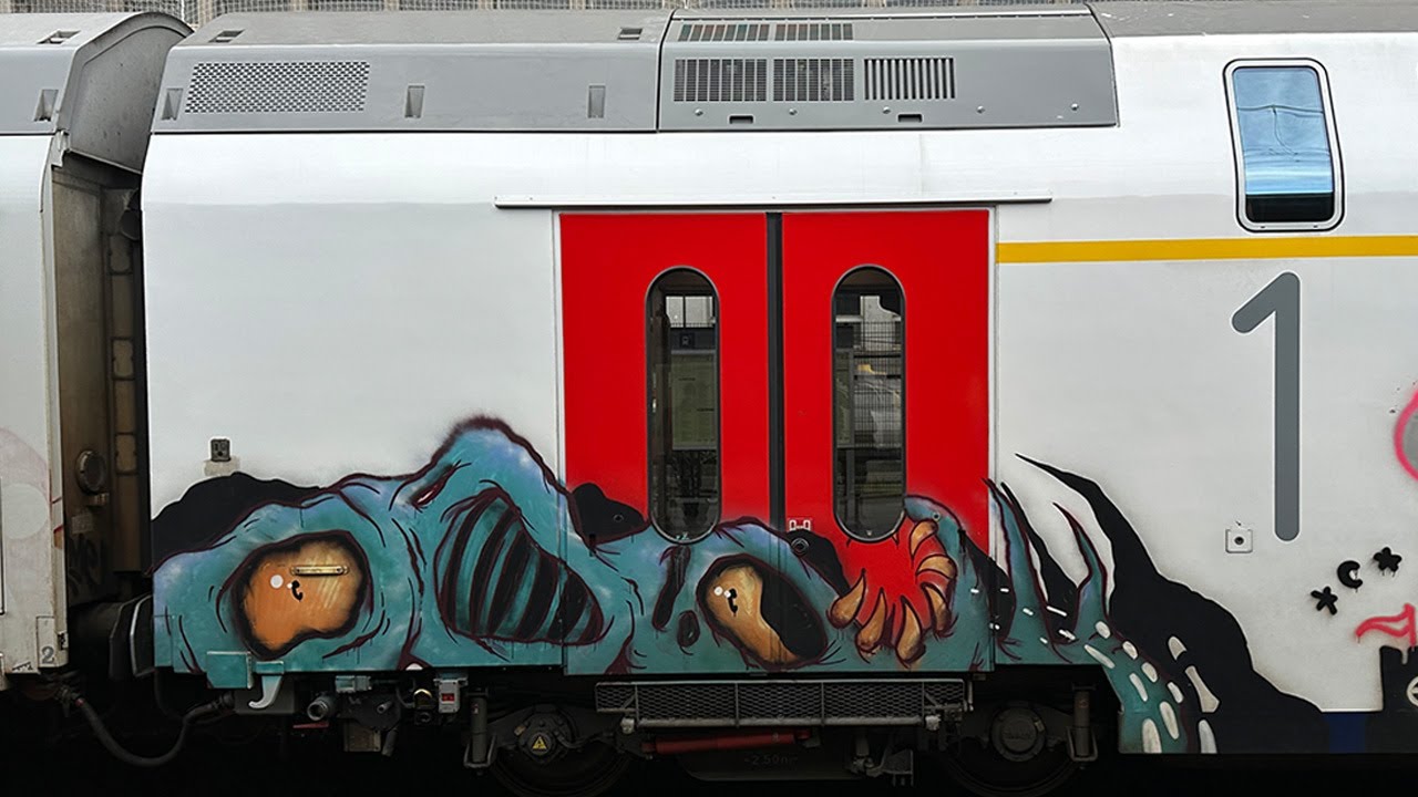 Painted trains spotting at Bxl Midi station.