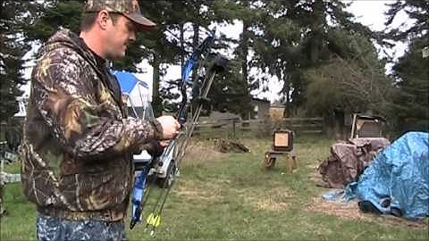 Splitting a playing card with an  arrow 15yards