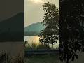 Beauty of nature // Sun reflection on water surface near mountain range