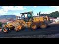 Volvo G930 Spreading Asphalt Downhill