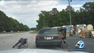 Video shows dangerous shootout between deputies and man after being pulled over Resimi