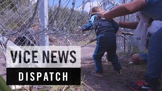 Cutting Through Hungary's Razor Wire Fence: Breaking Borders