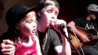 Justin Bieber sings Baby with a fan