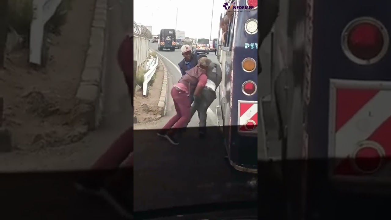 Touts of operating a PSV mini-bus plying Jogoo Road route in Nairobi manhandling  passenger