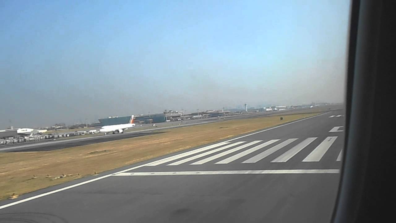 Cathay Pacific 747 First Class - Takeoff out front-facing window seat 1A