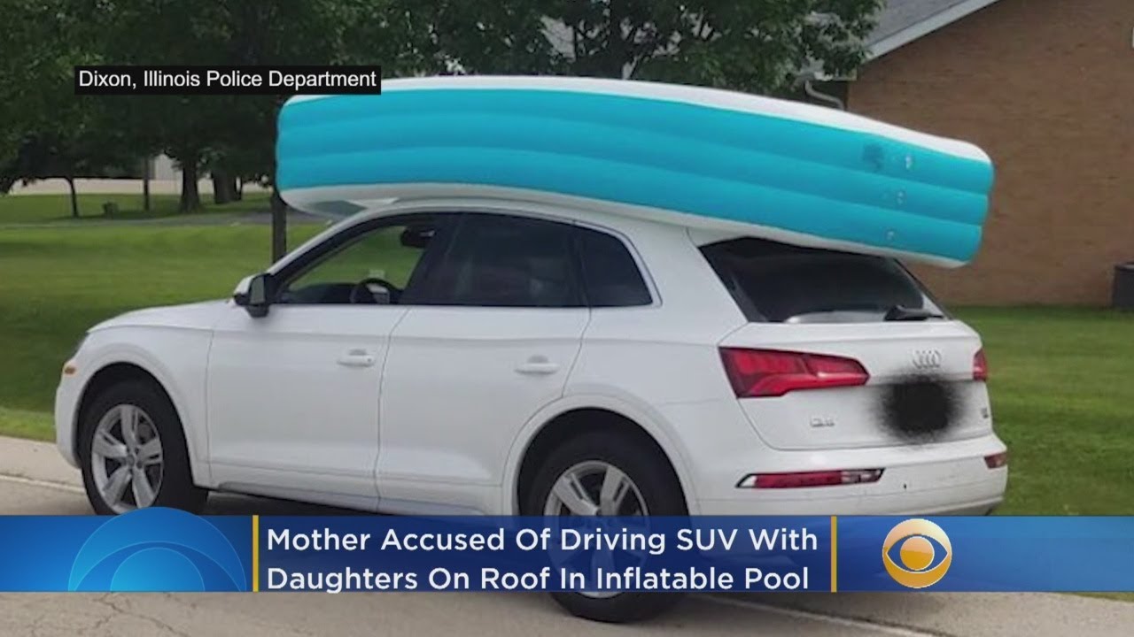 Mother Accused Of Driving SUV With Her Daughters On Roof In Inflatable