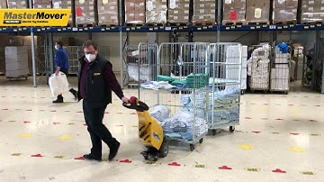 Moving Linked Roll Cages Using an Electric Tug | Facilities Management [VIDEO]