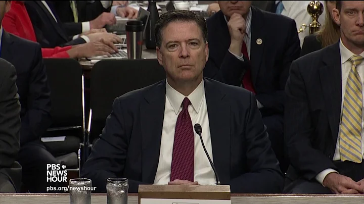 James Comey is sworn in before testifying before the Senate Intelligence Committee