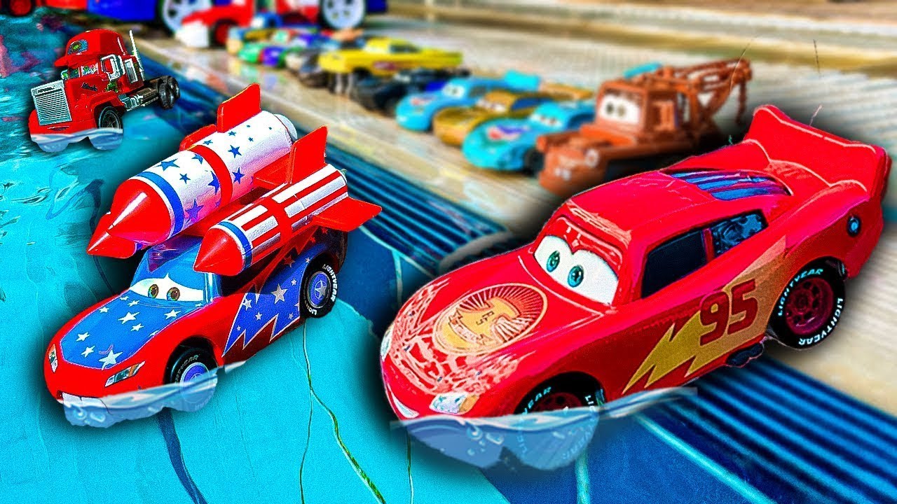Disney Pixar Cars Fall Into The Water Lightning McQueen, Chick Hicks