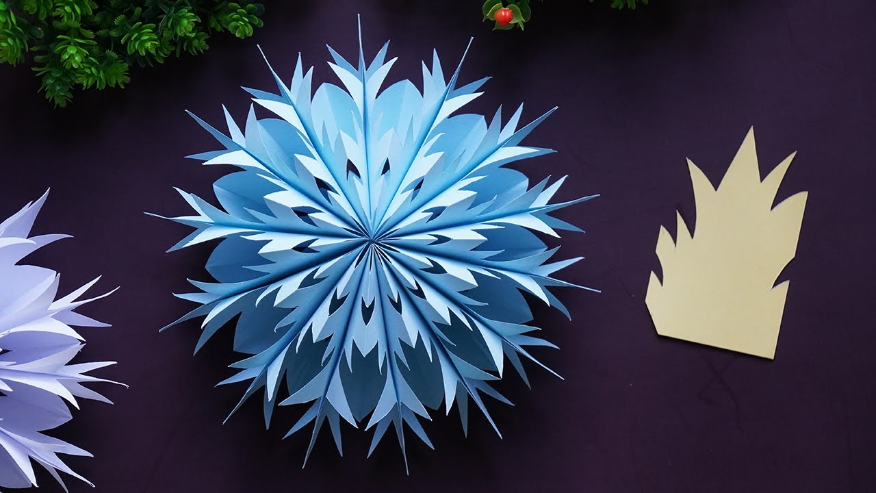 Easy 3-D Paper Snowflakes (with video Tutorial) - Happy Hooligans