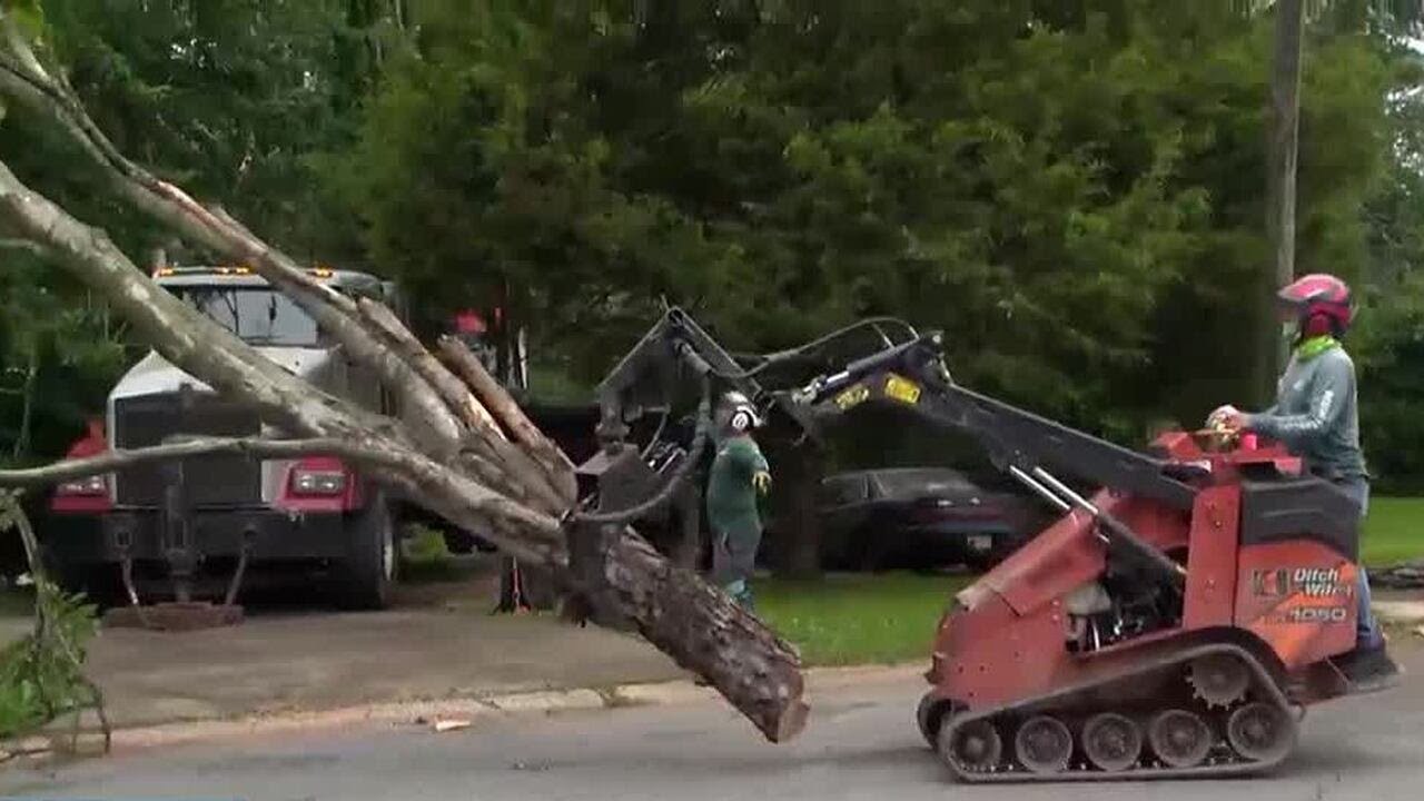Cleaning up after tornadoes moved through area - YouTube