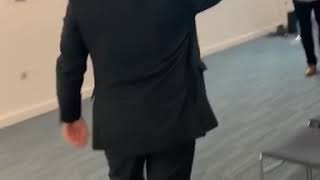 David Brent interrupting a meeting and doing the dance