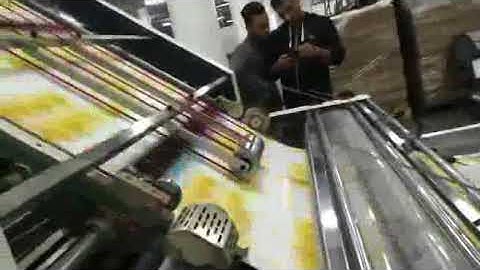 YB-1450HS servo type laminating machine and stacker running in our Jordan customer