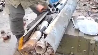 Разборка солдатом Украины, кассетного снаряда РСЗО Смерч России
