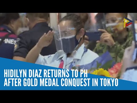 Hidilyn Diaz returns to PH after gold medal conquest in Tokyo