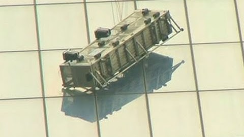 Raw: Workers Dangle From WTC Scaffolding