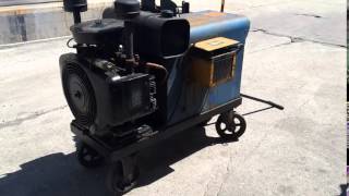 Portable gas powered Miller AEAD-200 LE MIG welder
