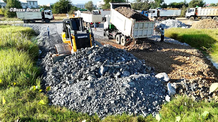 Best Landfill Work Use SHANTUI Massive Dozer Pushing Stones into Flood Land with Dump Trucks