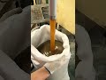 Filling grease into bags