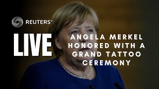 LIVE: Merkel is honored with a Grand Tattoo ceremony