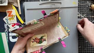 Working on travelers notebook clown circus junk journal - binding day