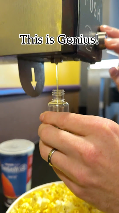 Jeff does this popcorn butter hack when we go to the movies! 🤣  #movietheater #popcorn #movies