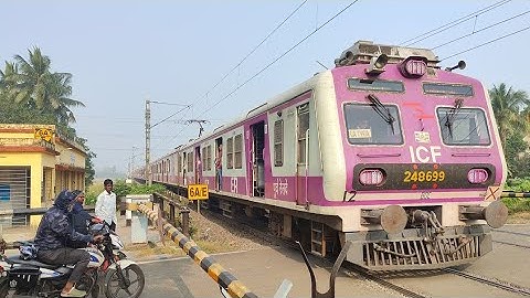 ICF made Pink color Modern & speedy Medha coaches made Howrah-katwa Local train skipping Rail gate