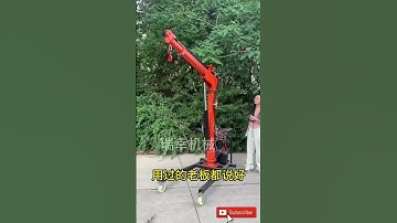 Efficient small electric hydraulic crane for heavy lifting.