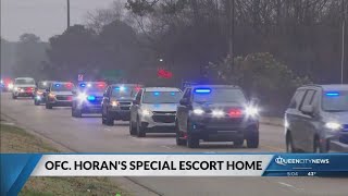 Multiple agencies escort Officer Michael Horan’s body back to Greensboro