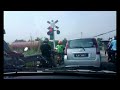 Class 29 passing Jalan Padang Lalang railway crossing