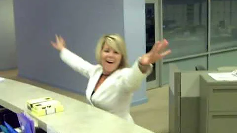 Angela Ganote doing a cartwheel in the newsroom