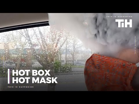 Smoke Billows Out of Mask When Woman Tries to Vape With Mask On