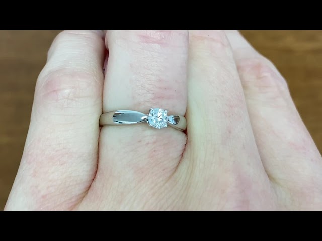 Tiffany Harmony® Round Brilliant Engagement Ring with a