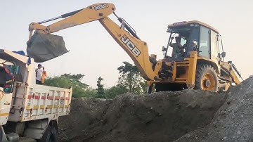 JCB Backhoe Loader Machine Loading on Mixed Ballast Tipper in Crusher Industry