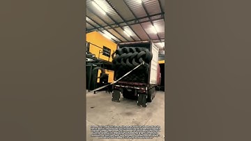 Unloading Old Car Tires From A Covered Truck Safely And Efficiently