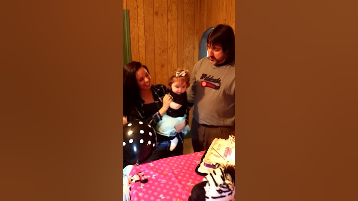 Ava's 1st Birthday Blowing out candles