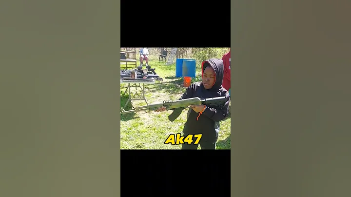 10 year old shooting an Ak47/Mac11