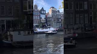 Living his best life #amsterdam #city #water #boat #positivevibes