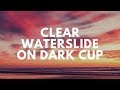 Clear Waterslide on a Dark Cup